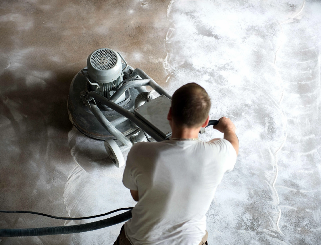 Worker Polishing a Concrete Floor